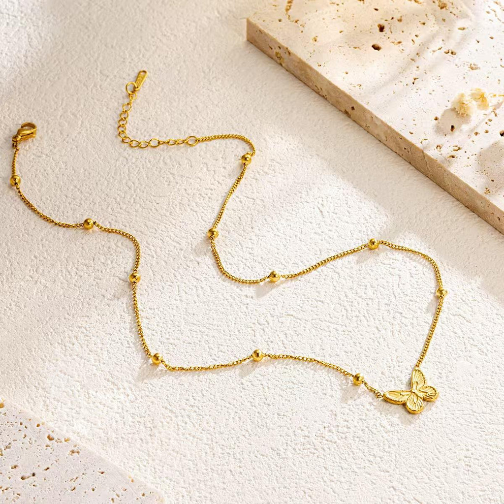Collana Farfalla in acciaio color oro