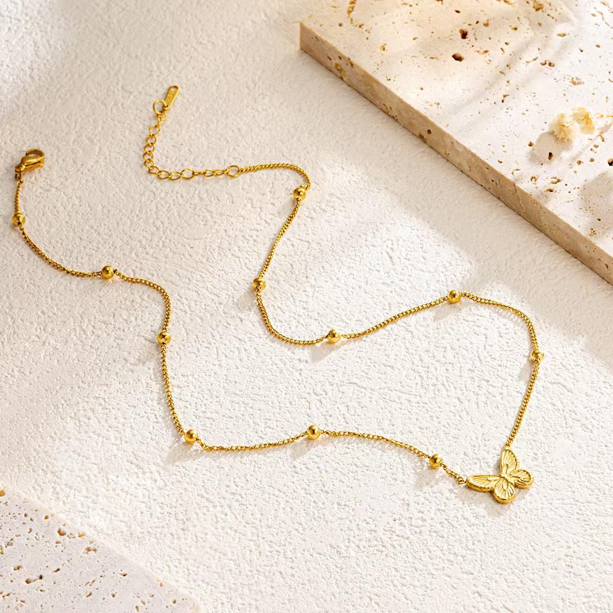 Collana Farfalla in acciaio color oro