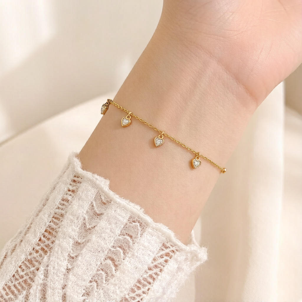 Cavigliera color oro con cuori luminosi
