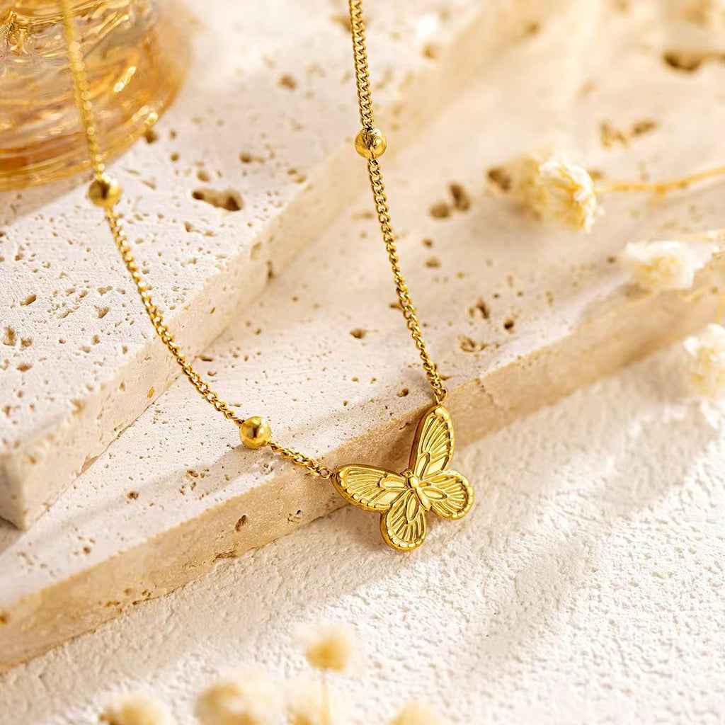 Collana Farfalla in acciaio color oro